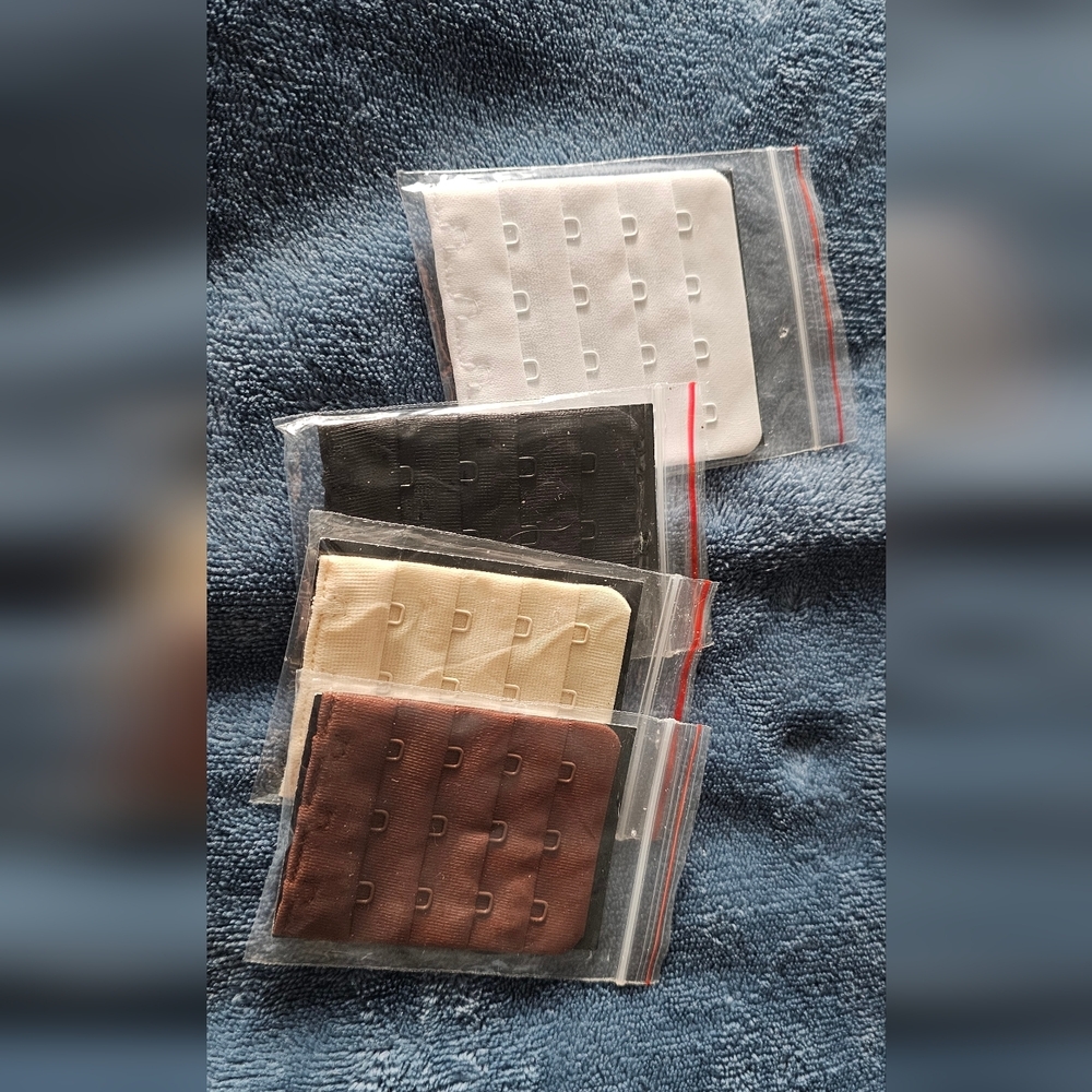 4 Bra Extenders (1) 4 hook (3) 3 hook brown, black, white and beige